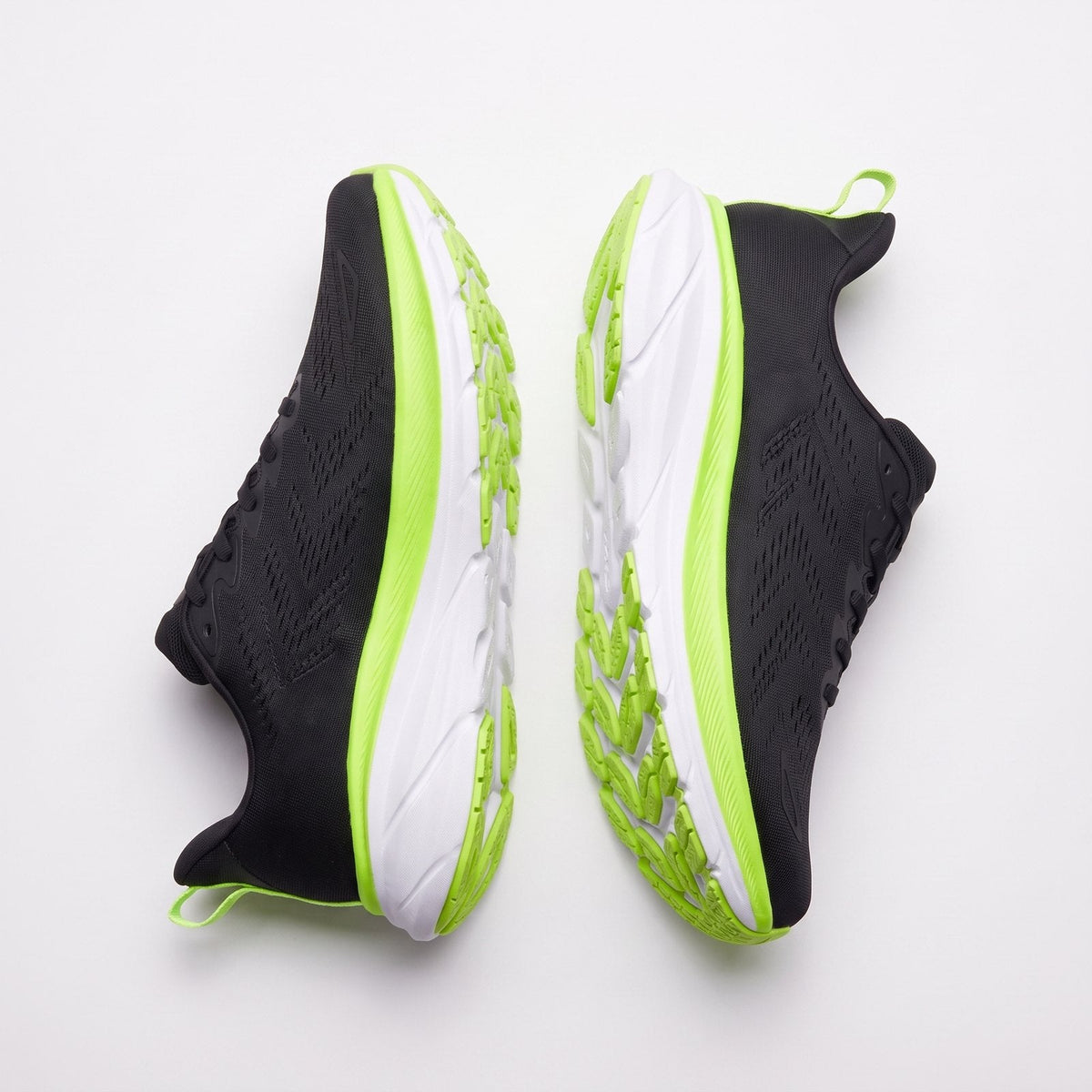 Pair of MOOVON Drift Max 01 running shoes, Black / Volt